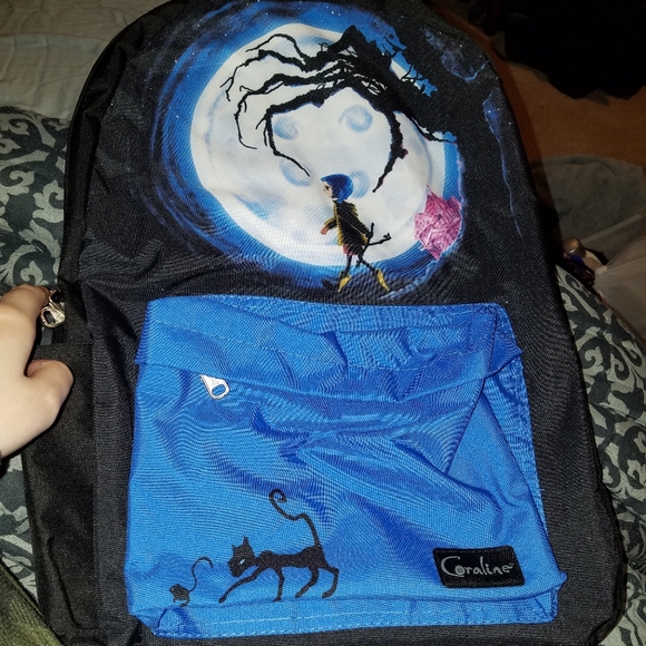 Hot Topic Handbags - Hottopic Coraline backpack